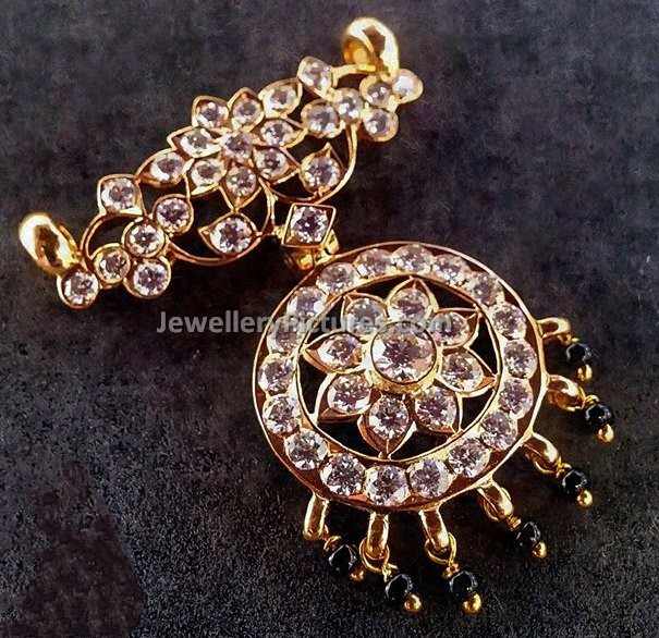 Round diamond  floral pendant with dangling black beads