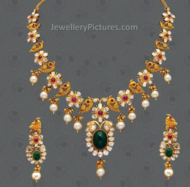 flat diamond peacock necklace earrings